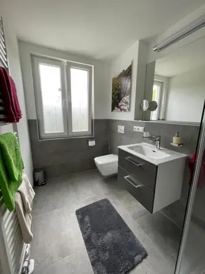 Ein Badezimmer in der Unterkunft Neues Ferienhaus