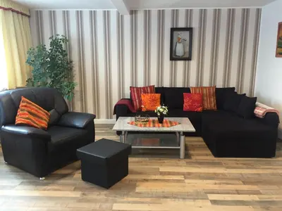 Ein Sitzbereich in der Unterkunft Ferienwohnung Lilienstein