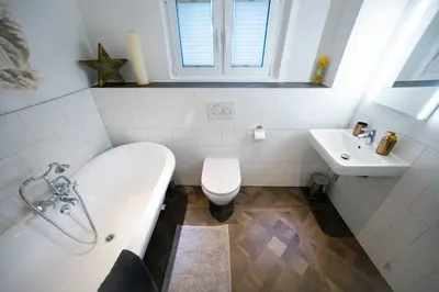 Ein Badezimmer in der Unterkunft Privatsphäre im Kutscherhaus der Villa Golding