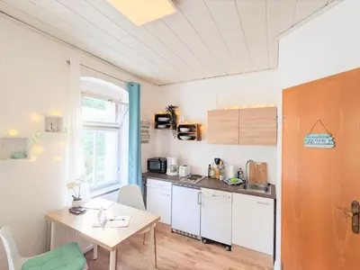 Küche/Küchenzeile in der Unterkunft H1 - Urlaubsmagie - Pool & Terrasse zum Entspannen