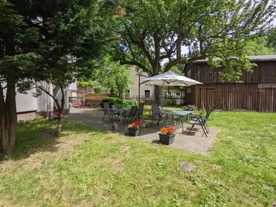 Ein Garten an der Unterkunft H5 - Urlaubsmagie - Wohlfühloase mit Pool