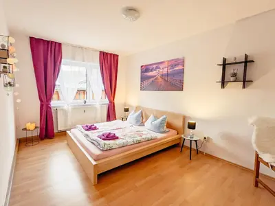 Ein Bett oder Betten in einem Zimmer der Unterkunft W5 - Urlaubsmagie - Wohnung mit Grill, Terrasse & Pool