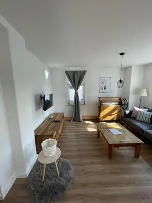 Ein Sitzbereich in der Unterkunft Apartmenthaus Elbblick Mühlberg