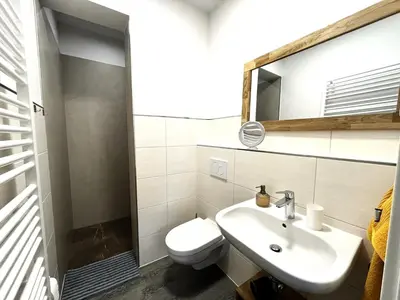 Ein Badezimmer in der Unterkunft Ferienwohnungen Landeskrone Dresden