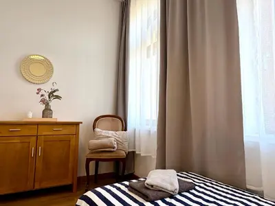 Ein Bett oder Betten in einem Zimmer der Unterkunft Ferienwohnungen Landeskrone Dresden