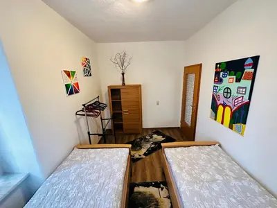 Ein Bett oder Betten in einem Zimmer der Unterkunft Gemütliche Wohnung in Grünhainichen Erzgebirge