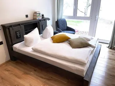 Ein Bett oder Betten in einem Zimmer der Unterkunft Igelnest Großthiemig