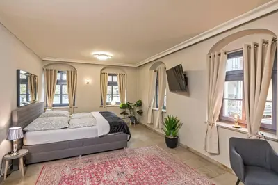 Ein Bett oder Betten in einem Zimmer der Unterkunft Cosel Palais Appartement