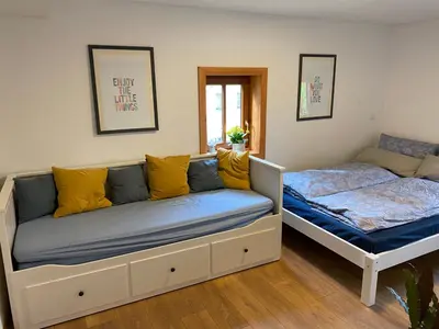 Ein Bett oder Betten in einem Zimmer der Unterkunft Ferienwohnung Lichterhof