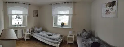 Ein Bett oder Betten in einem Zimmer der Unterkunft Ferienwohnung Zum Ausblick