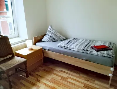 Ein Bett oder Betten in einem Zimmer der Unterkunft Ferienwohnung Karsten - nahe Chemnitz
