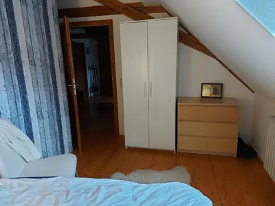 Ein Bett oder Betten in einem Zimmer der Unterkunft Schwalbennest Kaisitz