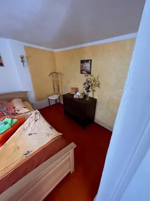 Ein Bett oder Betten in einem Zimmer der Unterkunft Ferienwohnung -IN LAPIDE REGIS-