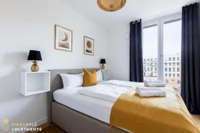 Ein Bett oder Betten in einem Zimmer der Unterkunft PINEAPPLE APARTMENTS - Altstadt I - 117qm - 1x free parking