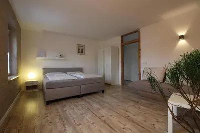Ein Bett oder Betten in einem Zimmer der Unterkunft Ferienwohnung in herrlicher Teichlandschaft