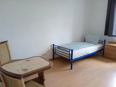 Ein Bett oder Betten in einem Zimmer der Unterkunft Apartments K11 für Monteure in Chemnitz