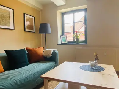 Ein Sitzbereich in der Unterkunft Am Engelserker - Ferienwohnungen in der Altstadt