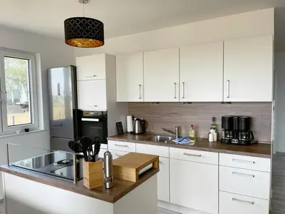 Küche/Küchenzeile in der Unterkunft Exklusives Apartment mit Blick auf den See