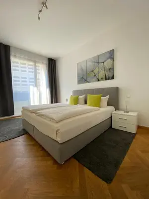 Ein Bett oder Betten in einem Zimmer der Unterkunft grosszügiges Apartment mit Blick zur Frauenkirche