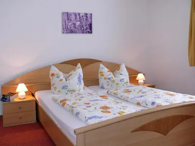 Ein Bett oder Betten in einem Zimmer der Unterkunft Ferienpension Gabriele 61