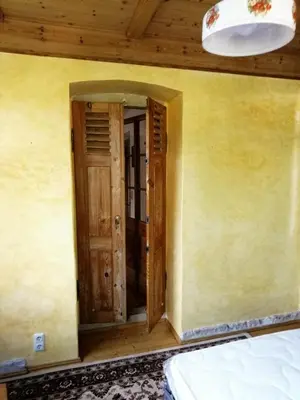 Ein Bett oder Betten in einem Zimmer der Unterkunft Ferienwohnung mit Charme in Dresden Pillnitz EG