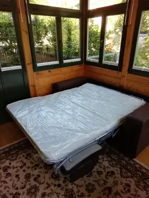 Ein Bett oder Betten in einem Zimmer der Unterkunft Ferienwohnung mit Charme in Dresden Pillnitz EG
