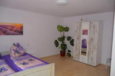 Ein Bett oder Betten in einem Zimmer der Unterkunft Ferienwohnung am Storchennest in Burkau