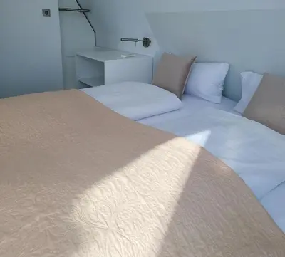 Ein Bett oder Betten in einem Zimmer der Unterkunft Ferienhaus Water