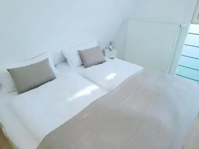 Ein Bett oder Betten in einem Zimmer der Unterkunft Ferienwohnung 