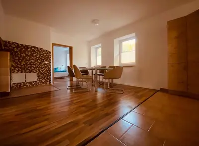 Ein Sitzbereich in der Unterkunft Ferienwohnung Nennigmühle