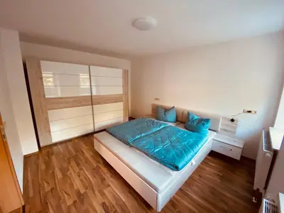 Ein Bett oder Betten in einem Zimmer der Unterkunft Ferienwohnung Nennigmühle