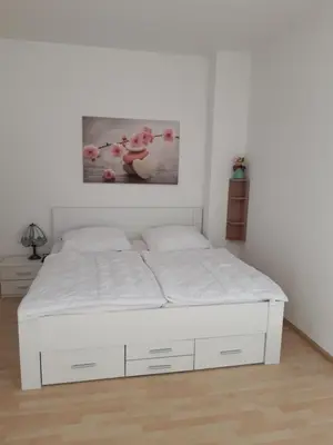 Ein Bett oder Betten in einem Zimmer der Unterkunft gemütliche kleine Ferienwohnung