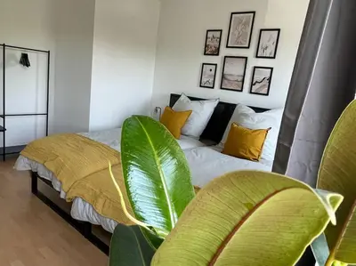 Ein Bett oder Betten in einem Zimmer der Unterkunft Modern 4 Zi Rooms Netflix, Wifi, Parken CasaLuna85