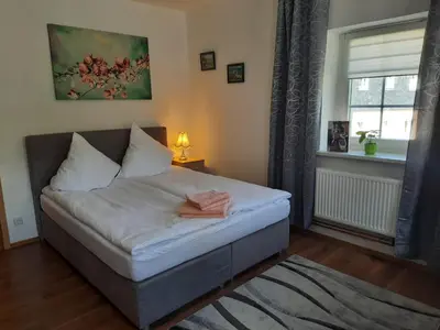 Ein Bett oder Betten in einem Zimmer der Unterkunft Haus Rauschenbach
