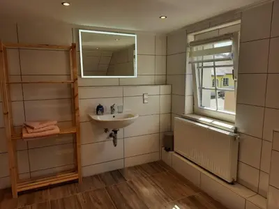 Ein Badezimmer in der Unterkunft Haus Rauschenbach