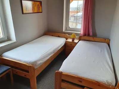 Ein Bett oder Betten in einem Zimmer der Unterkunft Apartment mit Balkon