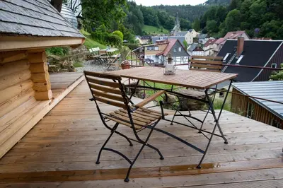 Ein Balkon oder eine Terrasse in der Unterkunft Kulturdenkmal Umgebinde1657
