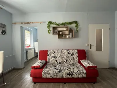 Ein Sitzbereich in der Unterkunft gemütliche kleine Ferienwohnung in Altenberg