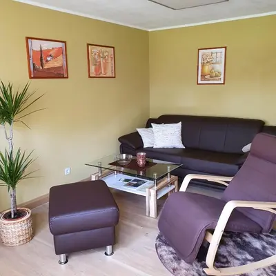 Ein Sitzbereich in der Unterkunft Ferienhaus Willkommen