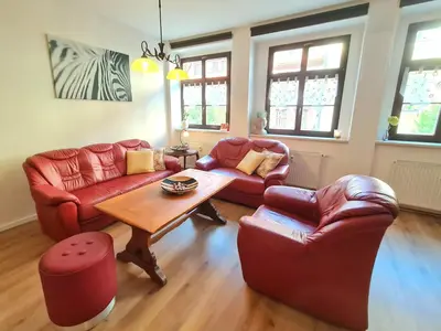 Ein Sitzbereich in der Unterkunft NEU: Großzügige Citywohnung mit XXL Dachterrasse!