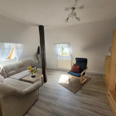 Ein Sitzbereich in der Unterkunft Ferienwohnung am Lockwitzbach
