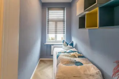 Ein Bett oder Betten in einem Zimmer der Unterkunft Ferienappartements-Milina