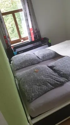 Ein Bett oder Betten in einem Zimmer der Unterkunft Ferienwohnung an der Begerburg