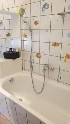 Ein Badezimmer in der Unterkunft Ferienwohnung an der Begerburg