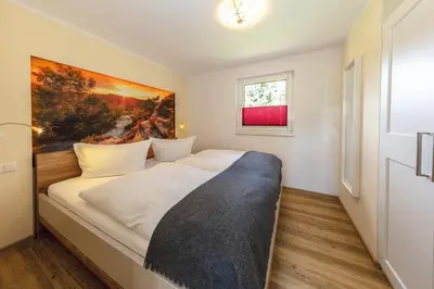 Ein Bett oder Betten in einem Zimmer der Unterkunft Laasenhof