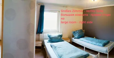 Ein Bett oder Betten in einem Zimmer der Unterkunft Ferienwohnung Monteurzimmer