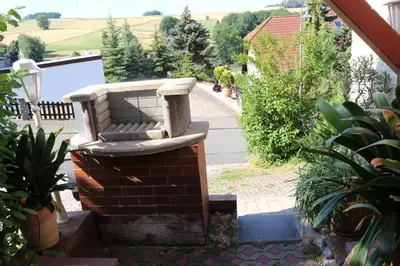 Ein Garten an der Unterkunft Kleine Wohngelegenheit am Stadtrand von Chemnitz