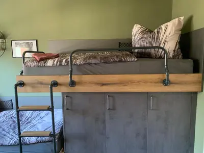 Ein Bett oder Betten in einem Zimmer der Unterkunft Gästezimmer in einer Ferienwohnung Thiele in Roßwein