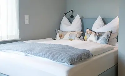 Ein Bett oder Betten in einem Zimmer der Unterkunft Haus Welzel