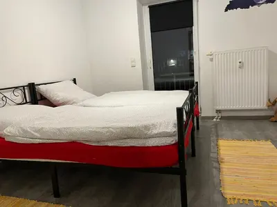 Ein Bett oder Betten in einem Zimmer der Unterkunft MyHome Einsiedel an der Zwönitz 2